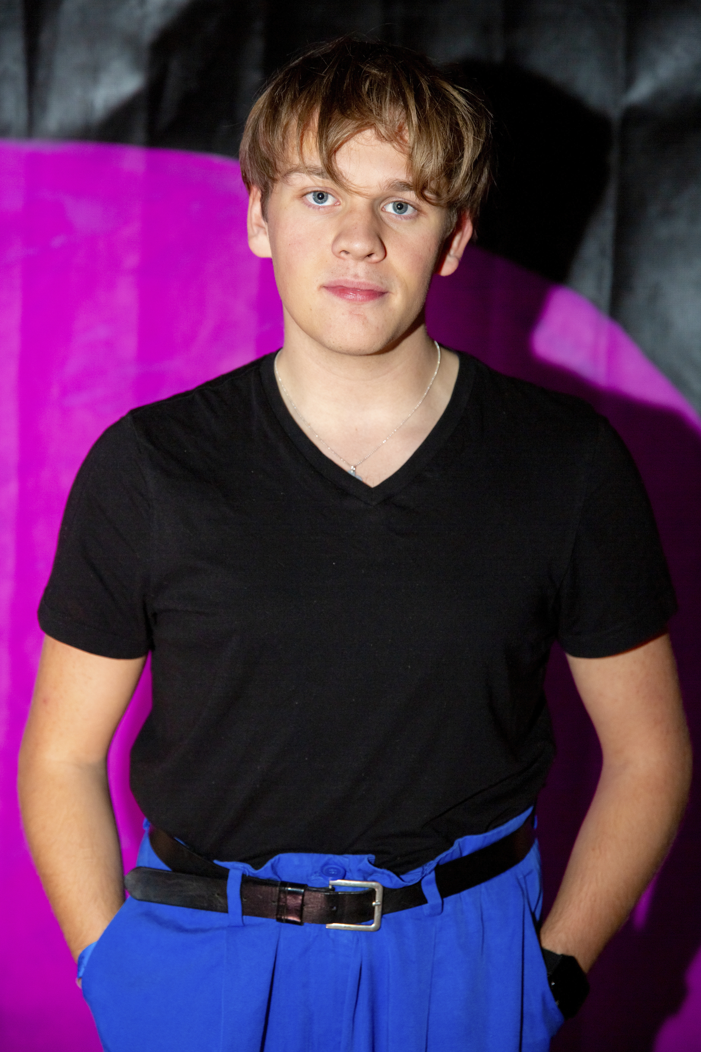 Portrait of Andreas Magnusson with a black and purple background.